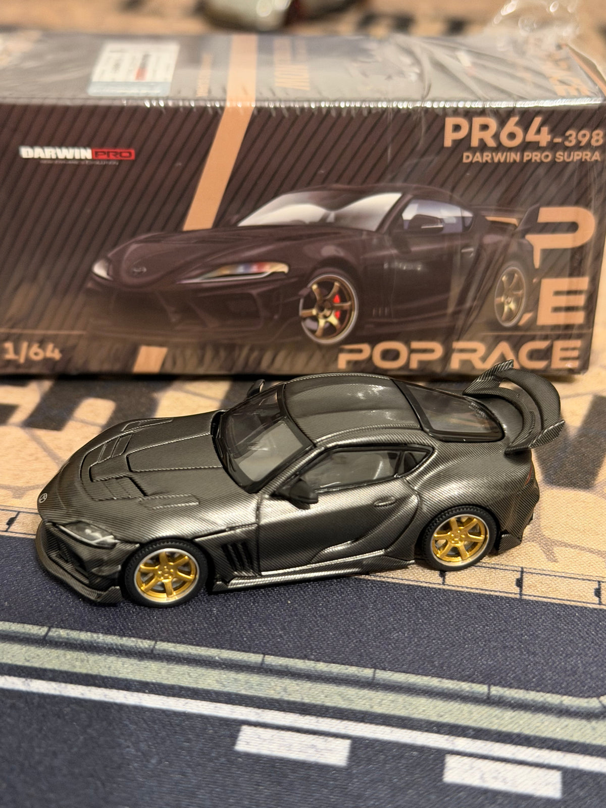 Pop Race 1:64 Darwin PRO Toyota Supra Black Carbon 398