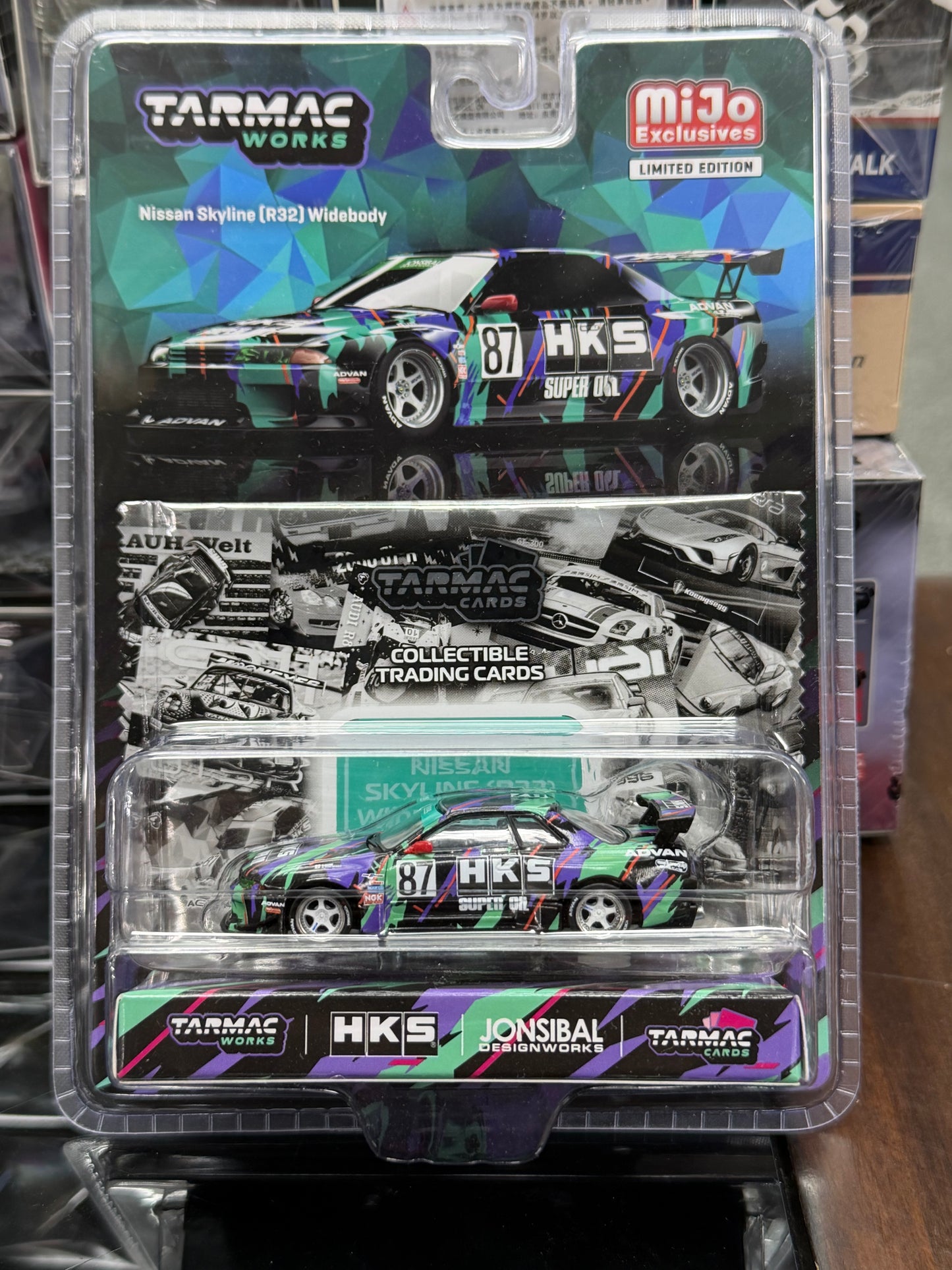 Tarmac Works 1:64 Nissan Skyline (R32) Widebody Jonsibal Designworks & HKS with Card Pack – Blue, Green, Black – Tarmac Cards MiJo Exclusives Limited Edition