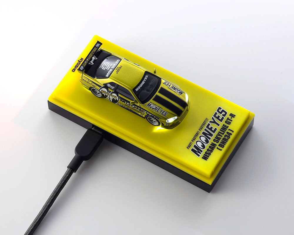 Preorder) Kyosho 1:64 Nissan GT-R (R-34) Mooneye’s 1 with MOTN LED Base Compatible -Liquid Yellow **Light Up Base Sold Separately**