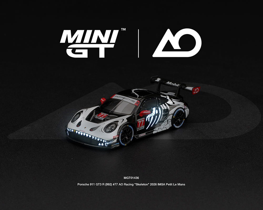 Preorder) Mini GT 1:64 Porsche 911 GT3 R (992) #77 AO Racing “Skeleton Rexy” 2026 IMSA Petit Le Mans – (Glow in the Dark) – Limited Edition