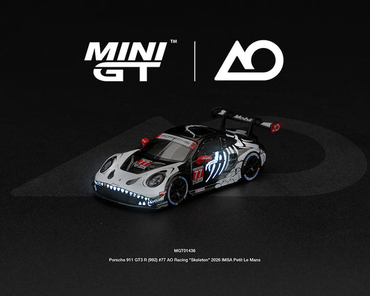 Preorder) Mini GT 1:64 Porsche 911 GT3 R (992) #77 AO Racing “Skeleton Rexy” 2026 IMSA Petit Le Mans – (Glow in the Dark) – Limited Edition
